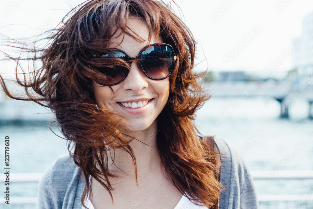Young Beautiful Woman Portrait With Manhattan Skyline in the Background . New York City US Young Beautiful Woman Portrait With Manhattan Skyline in the Background . New York City US