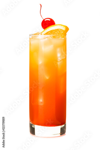 Tequila Sunrise alcoholic cocktail highball drink with orange and cherry garnish isolated on white background for use alone or as a design element