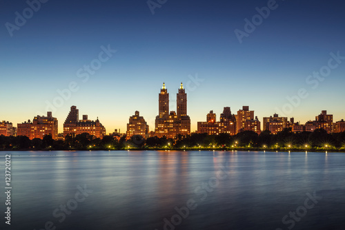 Upper West Side buildings and Central Park Jacqueline Kennedy Onassis Reservoir at twilight. Manhattan  New York City