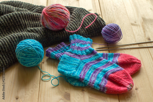 Knitted handmade baby socks, multicolor wool skeins