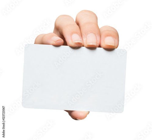 Manicured woman's hand holding blank credit business gift membership card isolated on white background