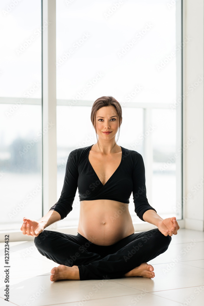 Young Pregnant Woman Yogi Practicing Yoga