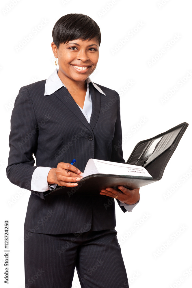Cheerful smiling female African American Businesswoman in suit with notebook isolated on white background Cheerful smiling female African American Businesswoman in suit with notebook isolated on white background