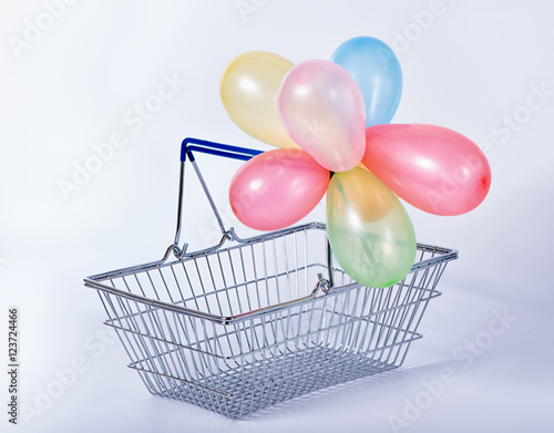 concept of black friday advert sale empty metal shopping basket