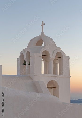 tower bell of Agios Minas church in Fira at sunset