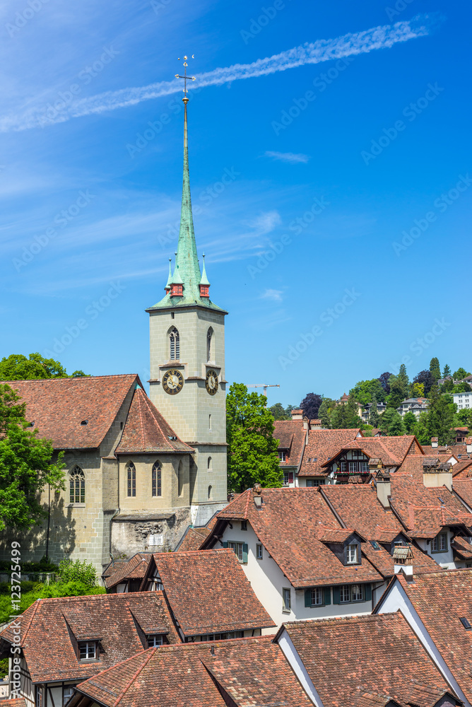 Bern cityscape. Swiss capital city. Nydeggkirche (Nydegg Church) and tiled rooftops Bern cityscape. Swiss capital city. Nydeggkirche (Nydegg Church) and tiled rooftops