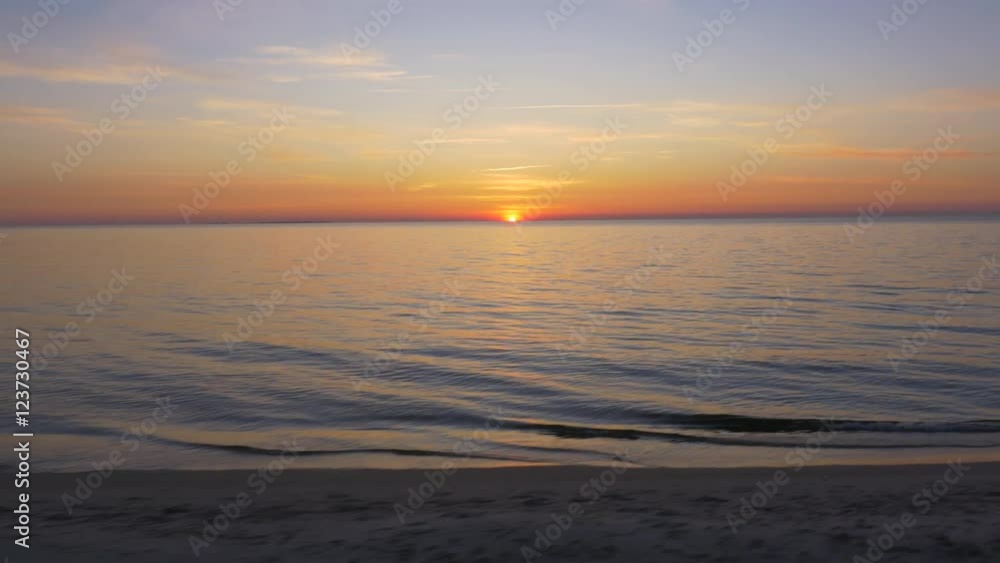 Aerial Shot of Beach and Sea in Sunset Light. Aerial Shot of Beach and Sea in Sunset Light.