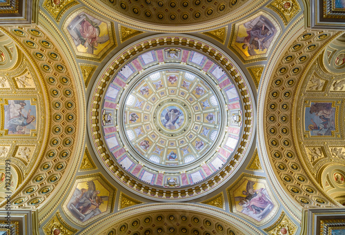Interior of the cupola. Decorated ceiling with mural and gold.