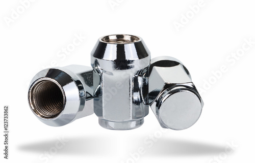 Three deaf wheel nuts on a white background