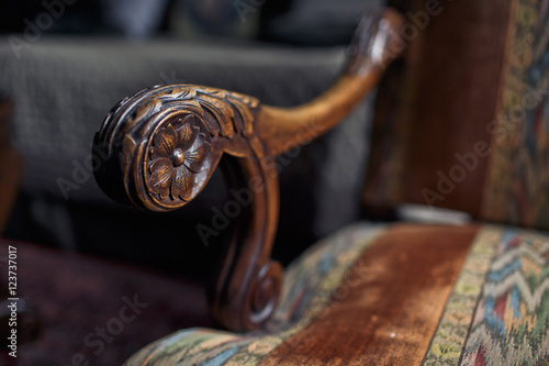 Antique wooden chair in the hotel room