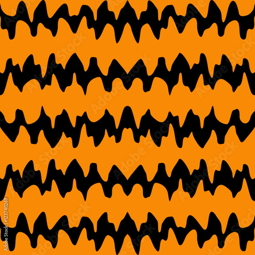Abstract seamless pattern for girls,boys, children, halloween.Creative vector background with waves.Funny wallpaper for textile and fabric.Fashion style.Colorful bright