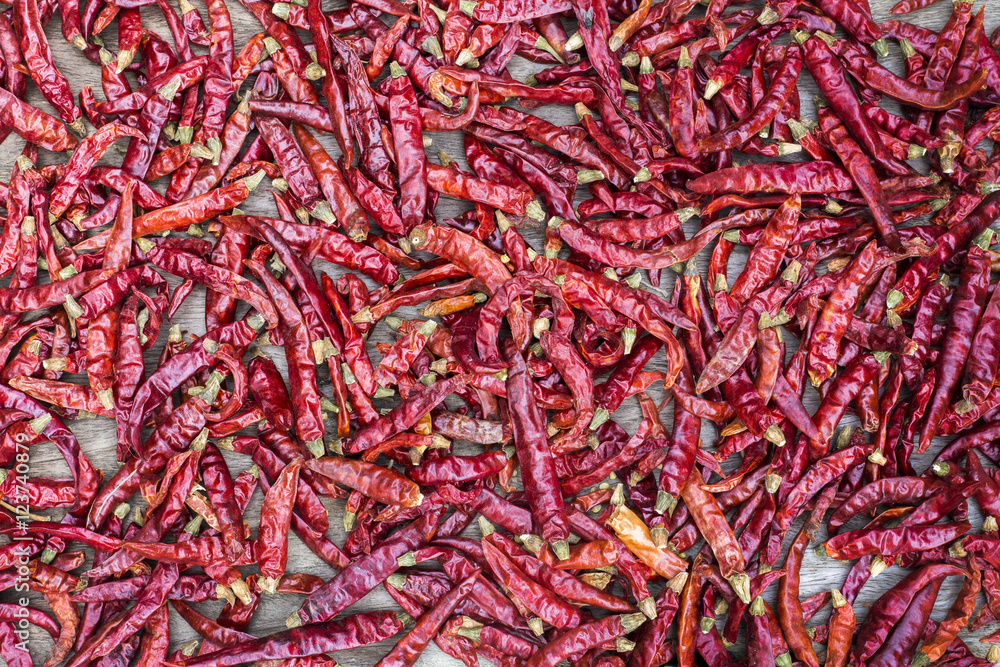 Fototapeta premium This is the chilli on a wood table.