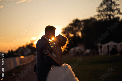 young couple meets a beautiful sunrise