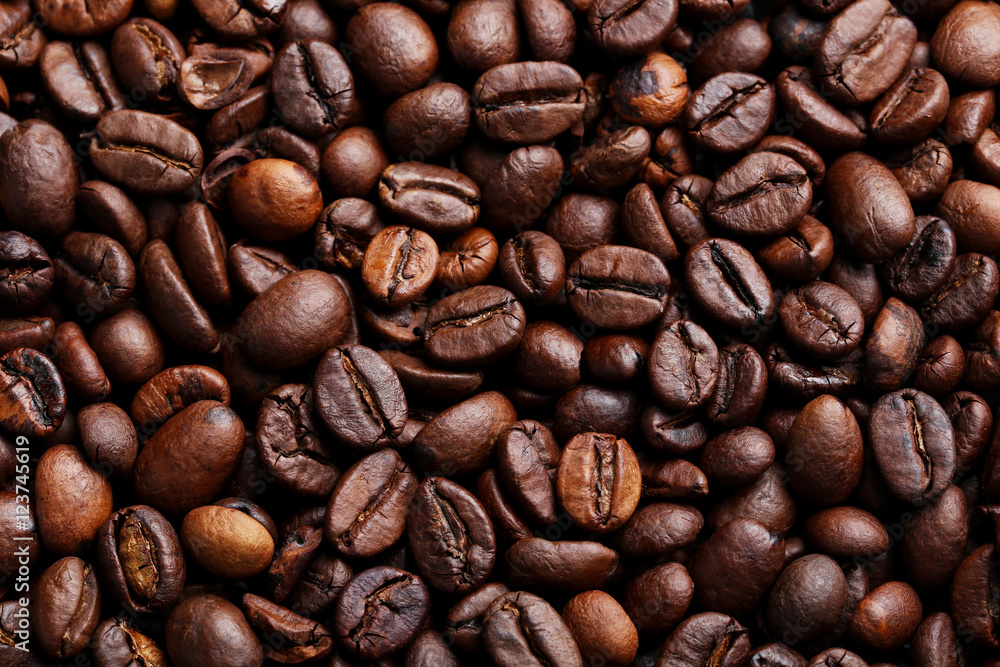 Brown roasted coffee beans background Brown roasted coffee beans background