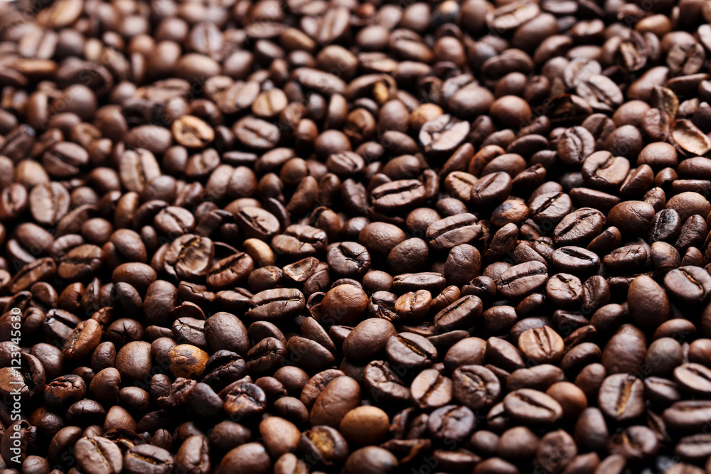 Brown roasted coffee beans background Brown roasted coffee beans background