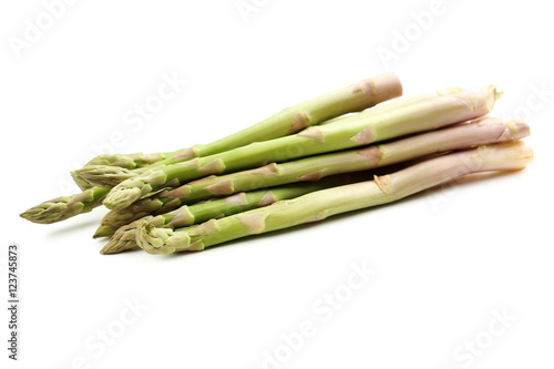 Fresh green asparagus isolated on a white