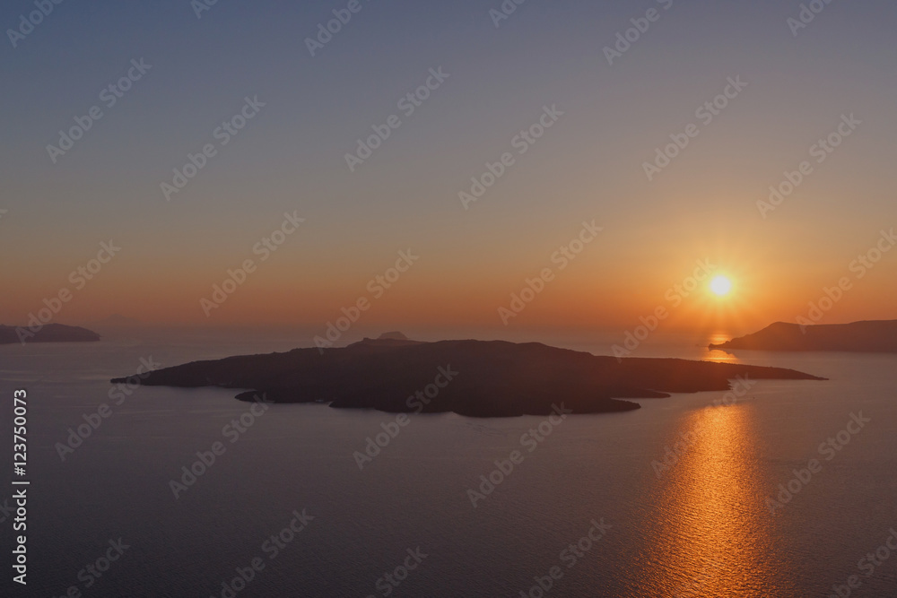 view on sunset behind caldera of Santorini