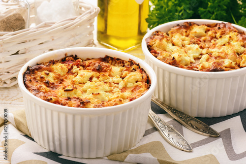 Pastitsio -greek casserole with pasta, meat, tomatoes and feta cheese.