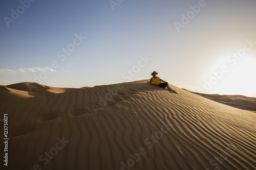Resting on a Rub'al Khali Desert Dune