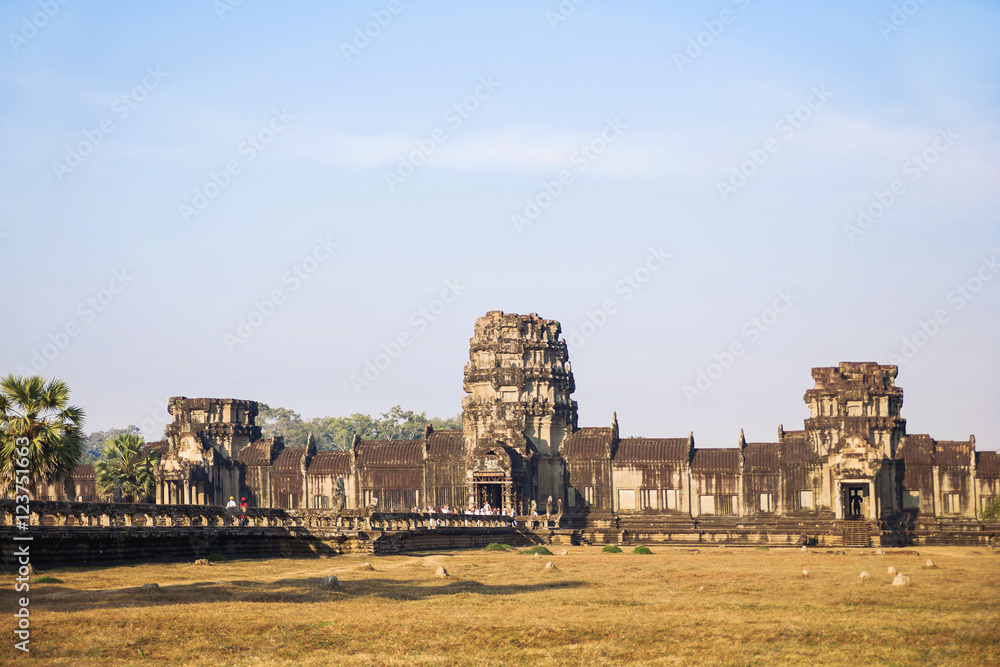 Tourists in Angkor Wat, temple complex in Siem Reap, Cambodia. UNESCO World Heritage Site.