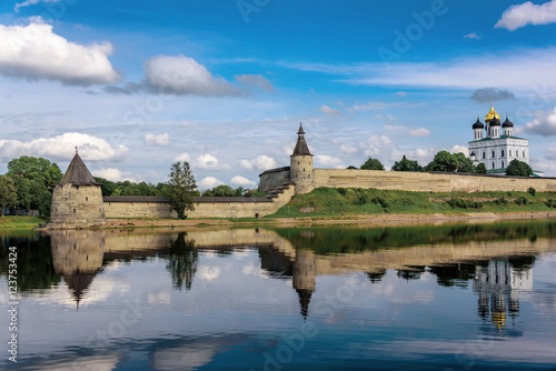 View of the Pskov Kremlin from Velikaya River in the summer in a sunny weather