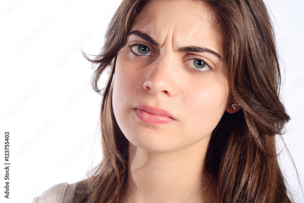 Young serious and angry woman.