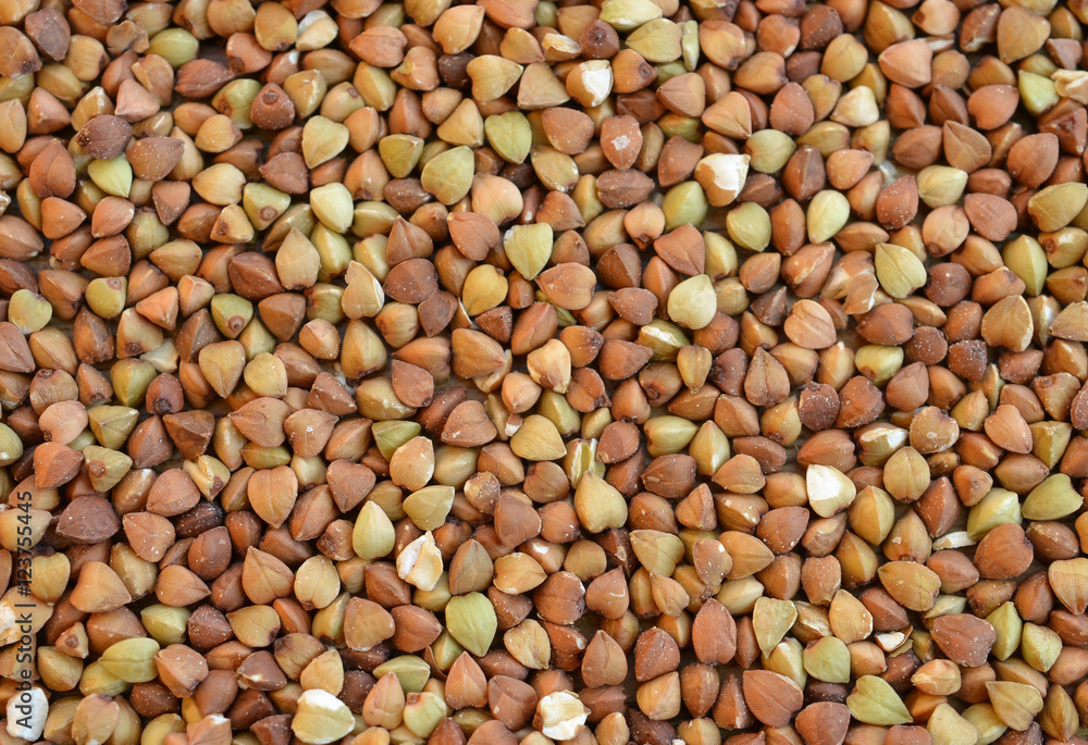 Buckwheat groats -texture or background. Buckwheat is a fruit seed and not a cereal as many think Buckwheat groats -texture or background. Buckwheat is a fruit seed and not a cereal as many think