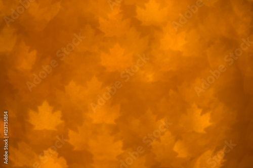 Defocused grunge maple leaves autumn yellow abstract background bokeh
