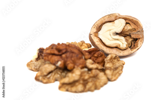 Kernels of walnut close up on white background