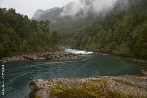 River Futaleufu flowing through mist shrouded forests in the Aysen Region of southern Chile. The river is renowned as one of the premier locations in the world for white water rafting. photo