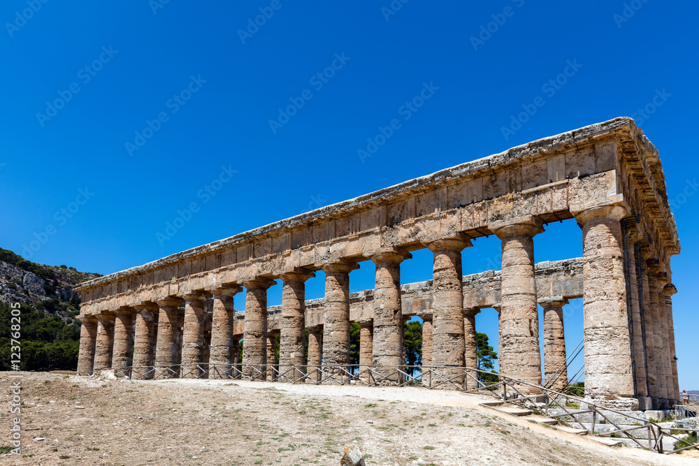 Unusually well preserved Greek Doric temple of Segesta is thought to have been built in the 420's BC by an Athenian architect and has six by fourteen columns on a base measuring 21 by 56 meters.