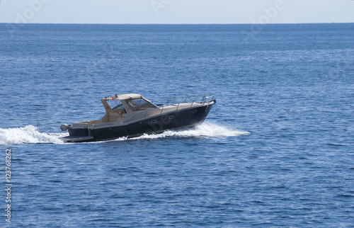 Motor boat while sailing