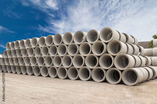 Stack of concrete drainage pipes for wells and water discharges