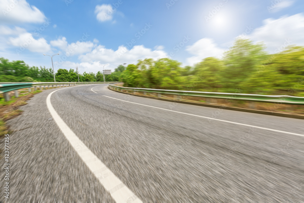 Fuzzy motion asphalt road under the blue sky Fuzzy motion asphalt road under the blue sky