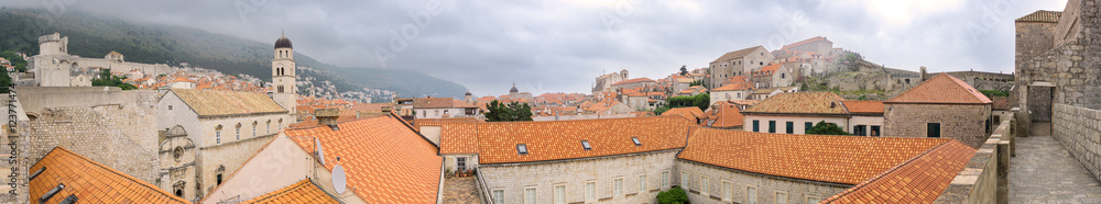 A wide angle view of the walled Croatian city of Dubrovnik as seen from the city walls.