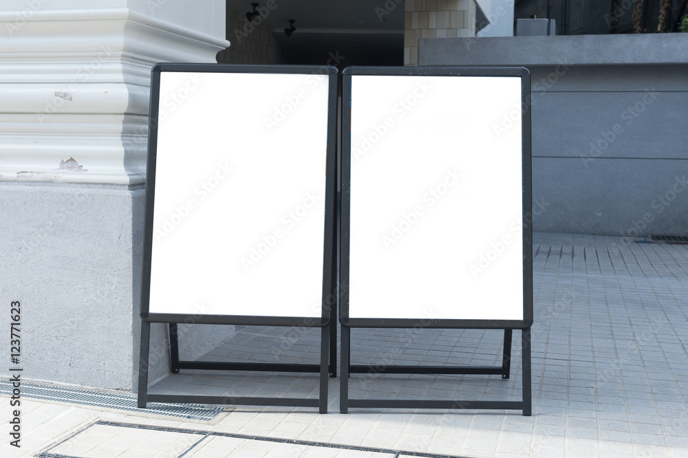 Large blank billboard on a street wall, banners with room to add your own text Large blank billboard on a street wall, banners with room to add your own text