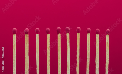 pile of matchsticks arrange in a row