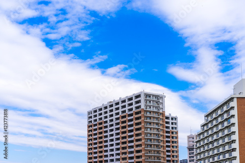 Residence image  apartment building against blue sky