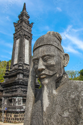 Khai Dinh Tomb Hue - Vietnam. Statue and tower at Khai Dinh Tomb Hue - Vietnam. Khai Ding was an Emperor of Vietnam from 1916 til his death is 1925 and built an empressive complex for his burial.
 photo