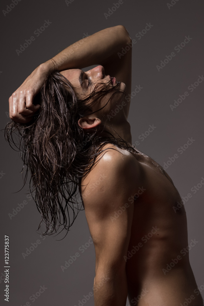 Fashion photography nude body young man model wet long hair Photos | Adobe  Stock