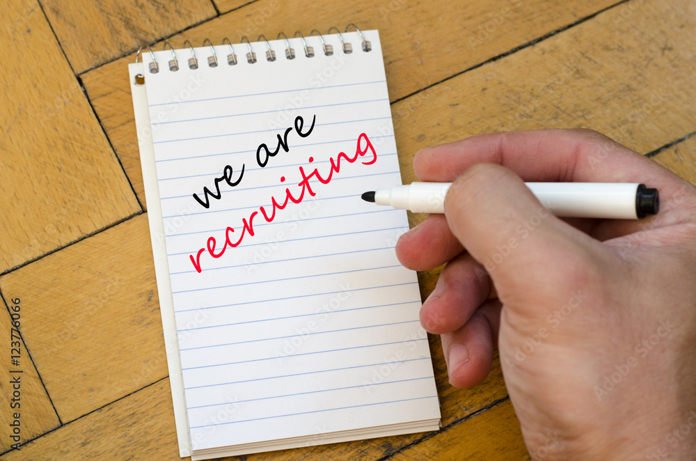 We are recruiting text concept on notebook We are recruiting text concept on notebook