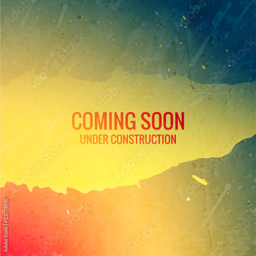 coming soon under construction text on grunge ink colorful backg