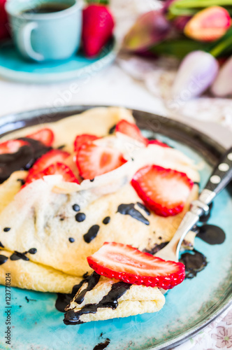 Freh strawberries and crepes
