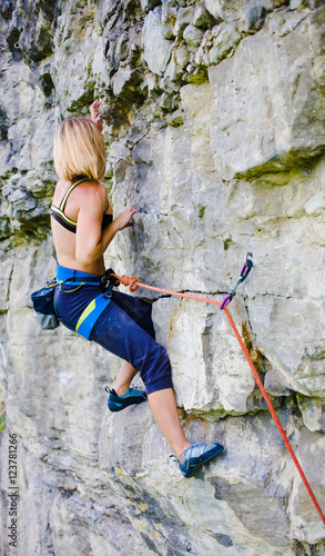 Sport climbing outdoors.