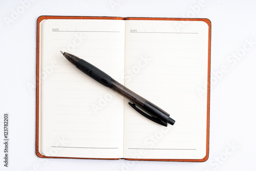 Wallpaper Mural notepad with pen isolated Torontodigital.ca