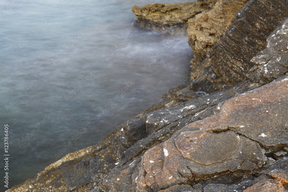 Aegean shore in Greece, Thassos island - waves and rocks - long exposure photography Aegean shore in Greece, Thassos island - waves and rocks - long exposure photography