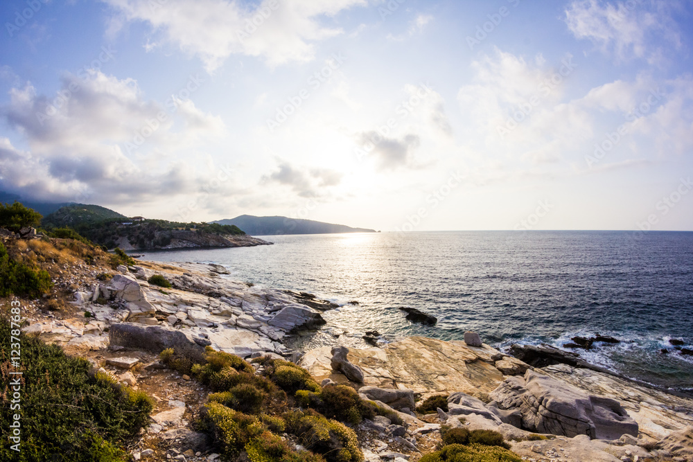 Aegean seashore and marble rocks in Aliki, Thassos island, Greece Aegean seashore and marble rocks in Aliki, Thassos island, Greece