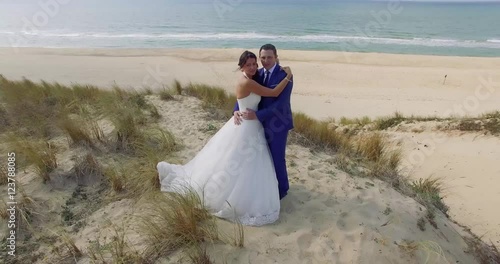 Bride and groom by the sea on their wedding day