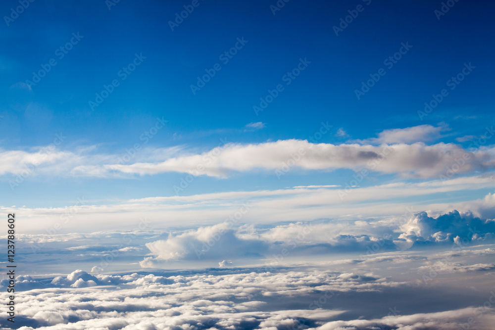 Beautiful, dramatic clouds and sky viewed from the plane. High resolution and quality