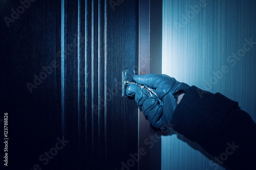 man in gloves opens the door Close up photo